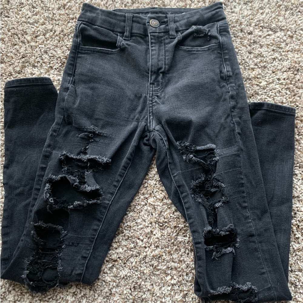 black ripped jeans